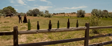 Man Sharp Shooting Bottles Fail GIF