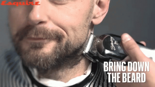 Man Shaving Beard with Razor