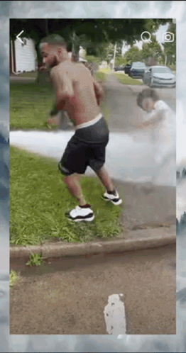 Man Shirtless Walking Down Street
