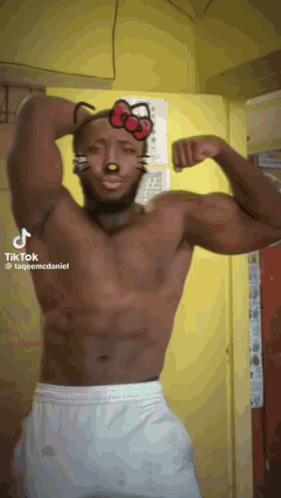 Man Shirtless Wearing Hello Kitty Mask