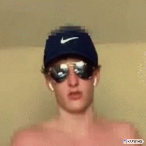 Man Shirtless Wearing Nike Hat And Sunglasses Making Funny Face GIF
