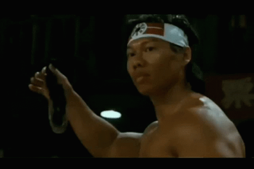 Man Shirtless with Karate Bandana
