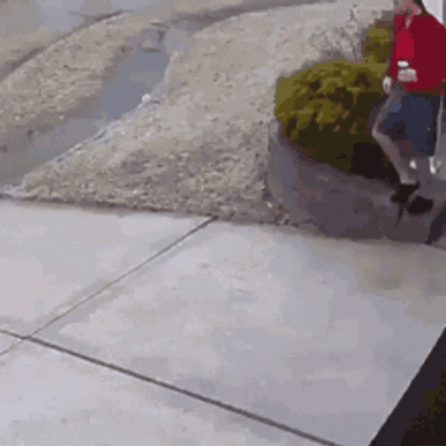 Man Shoes Threw Off When Slipping On Ice GIF
