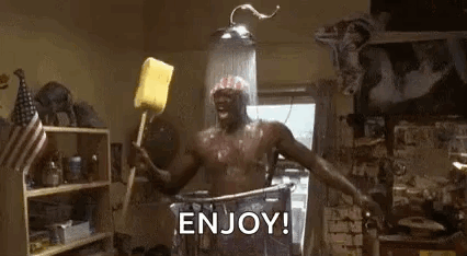 Man Showering Holding Sponge