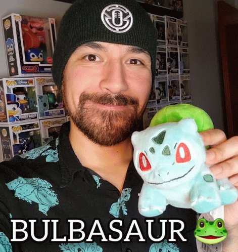 Man Showing Bulbasaur Stuffed Toy GIF