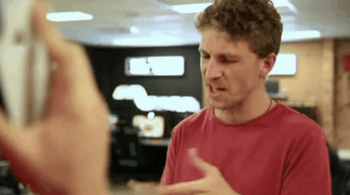 Man Showing Monopoly Money To Another Guy GIF