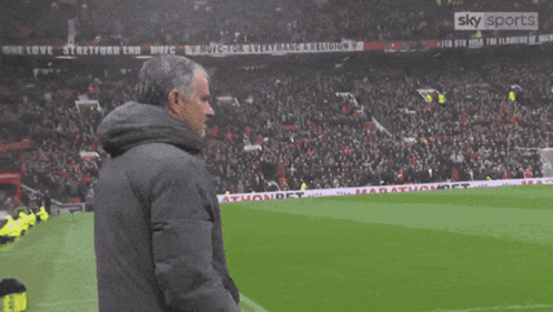 Man Shushing on Soccer Field