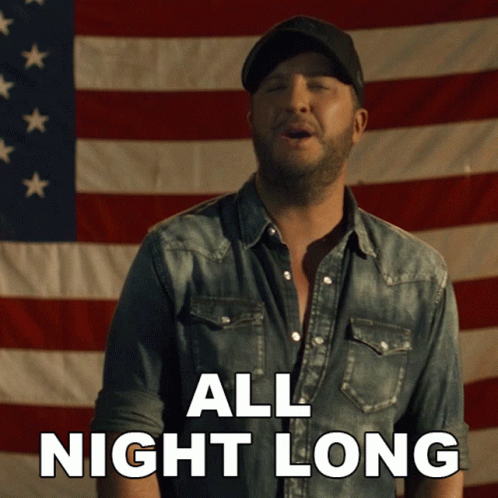 Man Singing In Front Of American Flag All Night Long GIF
