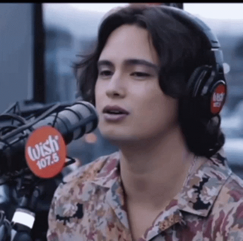 Man Singing Into Microphone GIF
