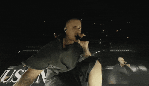 Man Singing Into Microphone GIF
