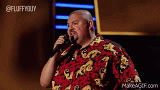 Man Singing Into Microphone