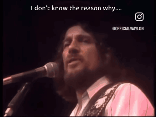 Man Singing Into Microphone And Playing Guitar GIF