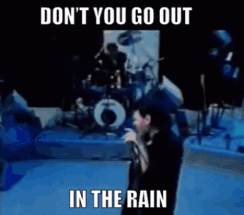 Man Singing Into Microphone Don't You Go Out In The Rain