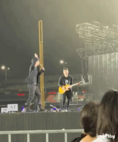 Man Singing Into Microphone GIF