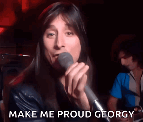 Man Singing Into Microphone Make Me Proud George