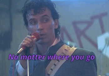 Man Singing Into Microphone No Matter Where You Go