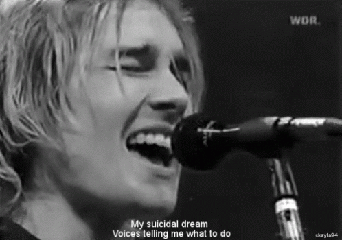 Man Singing Into Microphone GIF