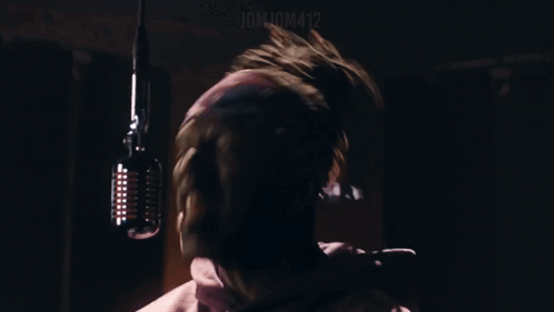 Man Singing Into Microphone Number 12