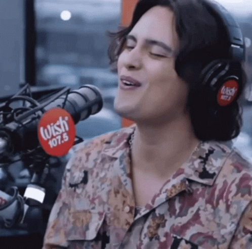 Man Singing Into Microphone GIF