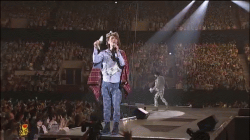 Man Singing Into Microphone GIF