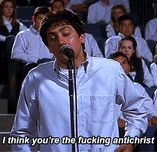 Man Singing Into Microphone Saying I Think You're the Fucking Antichrist
