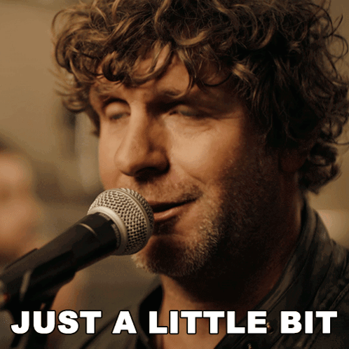 Man Singing Into Microphone Saying Just A Little Bit GIF