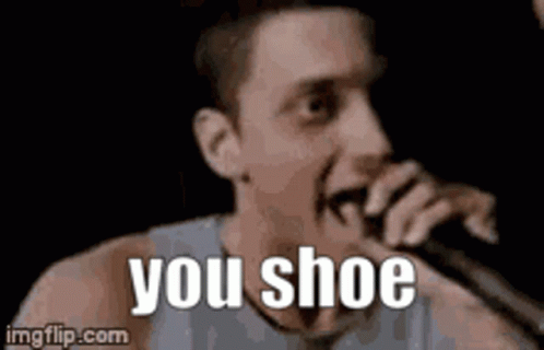 Man Singing Into Microphone Saying You Shoe