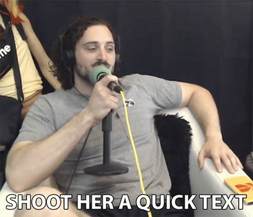 Man Singing Into Microphone Shoot Her a Quick Text