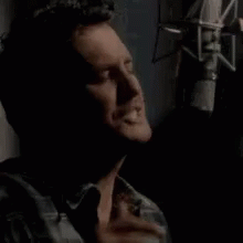 Man Singing Into Microphone So Damn Hot