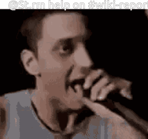 Man Singing Into Microphone st.rm help on #wiki-report