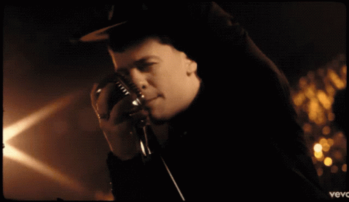 Man Singing Into Microphone Vevo GIF