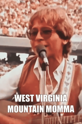 Man Singing Into Microphone West Virginia Mountain Momma