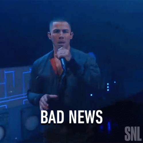 Man Singing Into Microphone With Bad News