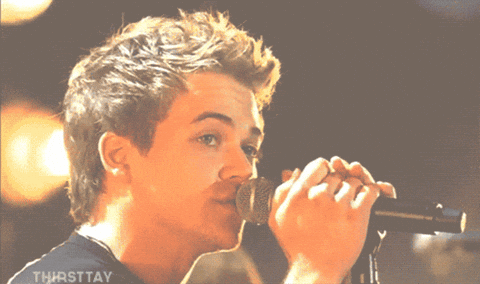 Man Singing Into Microphone With Thirsttay GIF