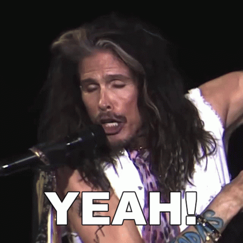 Man Singing Into Microphone Yeah