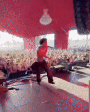 Man Singing Into Microphone GIF
