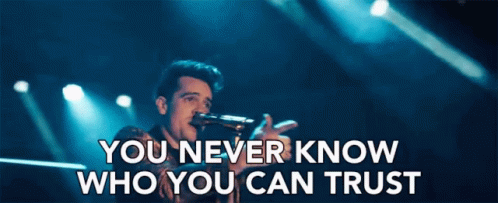 Man Singing Into Microphone You Never Know Who You Can Trust