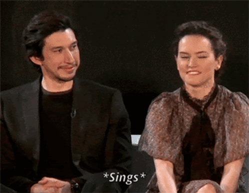 Man Singing Next To Woman GIF