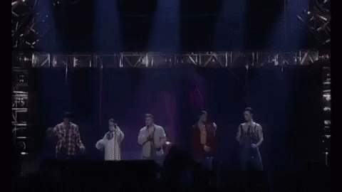 Man Singing Shirtless Into Microphone GIF