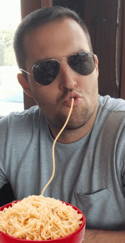 Man Sips On The Noodle GIF