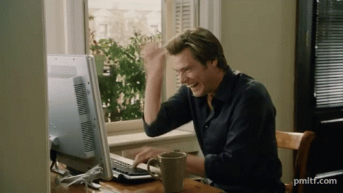 Man Sitting at Computer with pmitf.com
