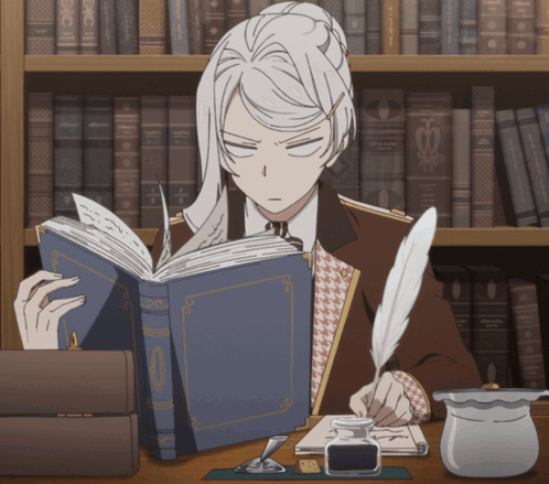 Man Sitting At Desk Reading And Writing GIF