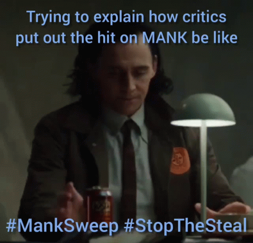Man Sitting at Desk Trying to Explain Critics Hit on Mank #Mansweep