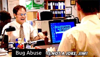 Man Sitting at Desk With Bug Abuse Sign