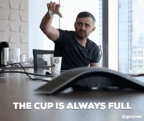 Man Sitting At Desk With Coffee And Computer Mouse GIF