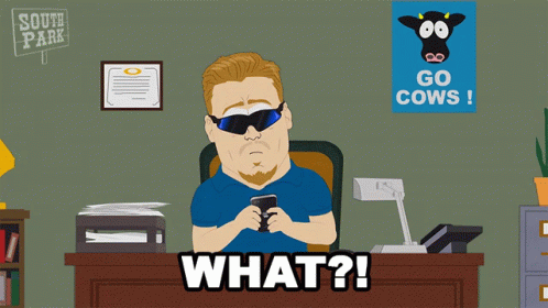 Man Sitting At Desk With Go Cows Poster GIF
