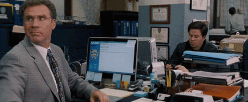 Man Sitting At Desk With NYPD Computer GIF