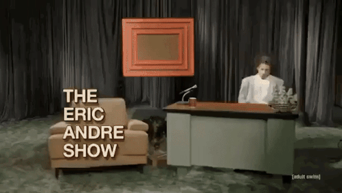 Man Sitting at Desk with The Eric Andre Show