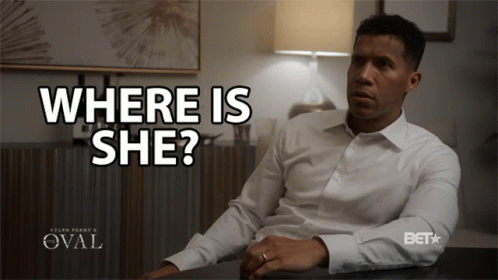Man Sitting at Desk With Where Is She