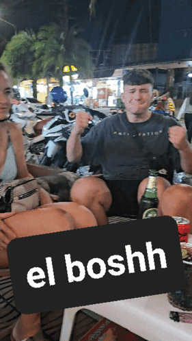 Man Sitting At El Boshhh Sign GIF